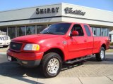 2001 Bright Red Ford F150 XLT SuperCab 4x4 #5391074