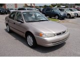 2000 Sandrift Metallic Toyota Corolla CE #54256133