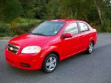 2010 Victory Red Chevrolet Aveo LT Sedan #54738851