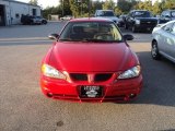 Victory Red Pontiac Grand Am in 2005