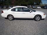 Vibrant White Ford Taurus in 2000