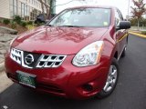 2011 Cayenne Red Nissan Rogue S AWD #55779665