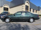 1999 Woodland Pearl Toyota Camry LE #55846711