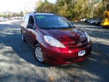 2009 Salsa Red Pearl Toyota Sienna LE AWD #55956937