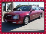 Crimson Red Pearl Cadillac DeVille in 2003
