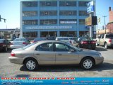 Light Parchment Gold Lincoln Town Car in 2003