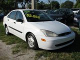 2000 Cloud 9 White Ford Focus LX Sedan #56451770