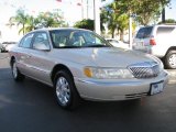 Ivory Parchment Tricoat Lincoln Continental in 1999