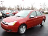 2011 Sangria Red Metallic Ford Focus SEL Sedan #57034698