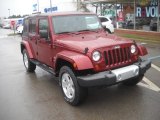 2009 Red Rock Crystal Pearl Jeep Wrangler Unlimited Sahara 4x4 #57034214