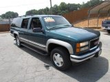 Emerald Green Metallic GMC Suburban in 1999