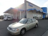 Green Pearl Metallic Nissan Altima in 1998