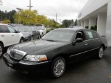 Black Lincoln Town Car in 2011