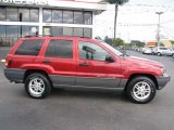 Inferno Red Tinted Pearlcoat Jeep Grand Cherokee in 2002