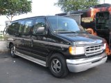 1999 Black Ford E Series Van E150 Custom Passenger #58664416