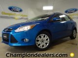 2012 Blue Candy Metallic Ford Focus SE Sedan #58684197