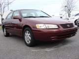 Vintage Red Pearl Toyota Camry in 1999