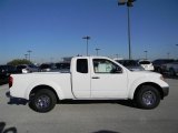 Avalanche White Nissan Frontier in 2012