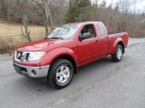2010 Nissan Frontier SE V6 King Cab 4x4 Front 3/4 View