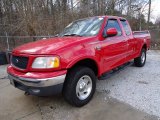 2000 Bright Red Ford F150 Lariat Extended Cab 4x4 #59739658