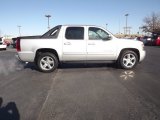 Sheer Silver Metallic Chevrolet Avalanche in 2010