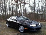 1997 Black Gold Saturn S Series SC2 Coupe #59860882