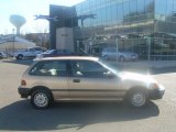 1990 Laguna Gold Metallic Honda Civic DX Hatchback #60561462