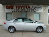 2012 Classic Silver Metallic Toyota Corolla LE #60696143