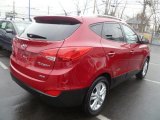 Garnet Red Hyundai Tucson in 2011