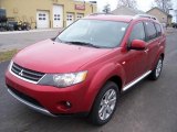 2009 Rally Red Metallic Mitsubishi Outlander SE #6088801