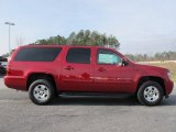 Crystal Red Tintcoat Chevrolet Suburban in 2012