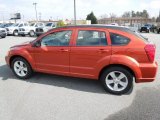 Sunburst Orange Pearl Dodge Caliber in 2010