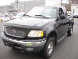 1999 Black Ford F150 XLT Extended Cab 4x4 #61761109