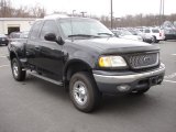 1999 Ford F150 XLT Extended Cab 4x4 Front 3/4 View