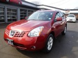 2009 Venom Red Nissan Rogue SL AWD #62377872