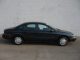 Tropic Green Metallic Ford Taurus in 1999