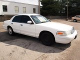 Vibrant White Ford Crown Victoria in 1999