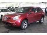 2009 Venom Red Nissan Rogue SL AWD #62976945