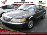 Midnight Grey Metallic Lincoln Continental in 1999