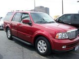 Vivid Red Metallic Lincoln Navigator in 2006