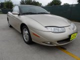 2002 Gold Saturn S Series SC2 Coupe #63723524