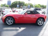 Aggressive Red Pontiac Solstice in 2009