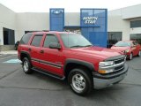 Victory Red Chevrolet Tahoe in 2002