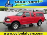 2002 Bright Red Ford F150 XLT SuperCab 4x4 #64976177