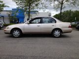 1997 Cashmere Beige Metallic Toyota Corolla DX #64976005