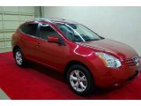 2009 Venom Red Nissan Rogue SL #65041503