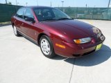 2002 Cranberry Saturn S Series SL2 Sedan #65306922