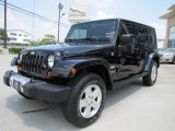 2009 Jeep Wrangler Unlimited Sahara 4x4 Front 3/4 View