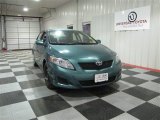 2009 Capri Sea Green Metallic Toyota Corolla LE #65553477