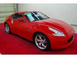 2011 Solid Red Nissan 370Z Touring Coupe #65802042